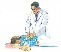 chiropractor performing a spinal adjustment